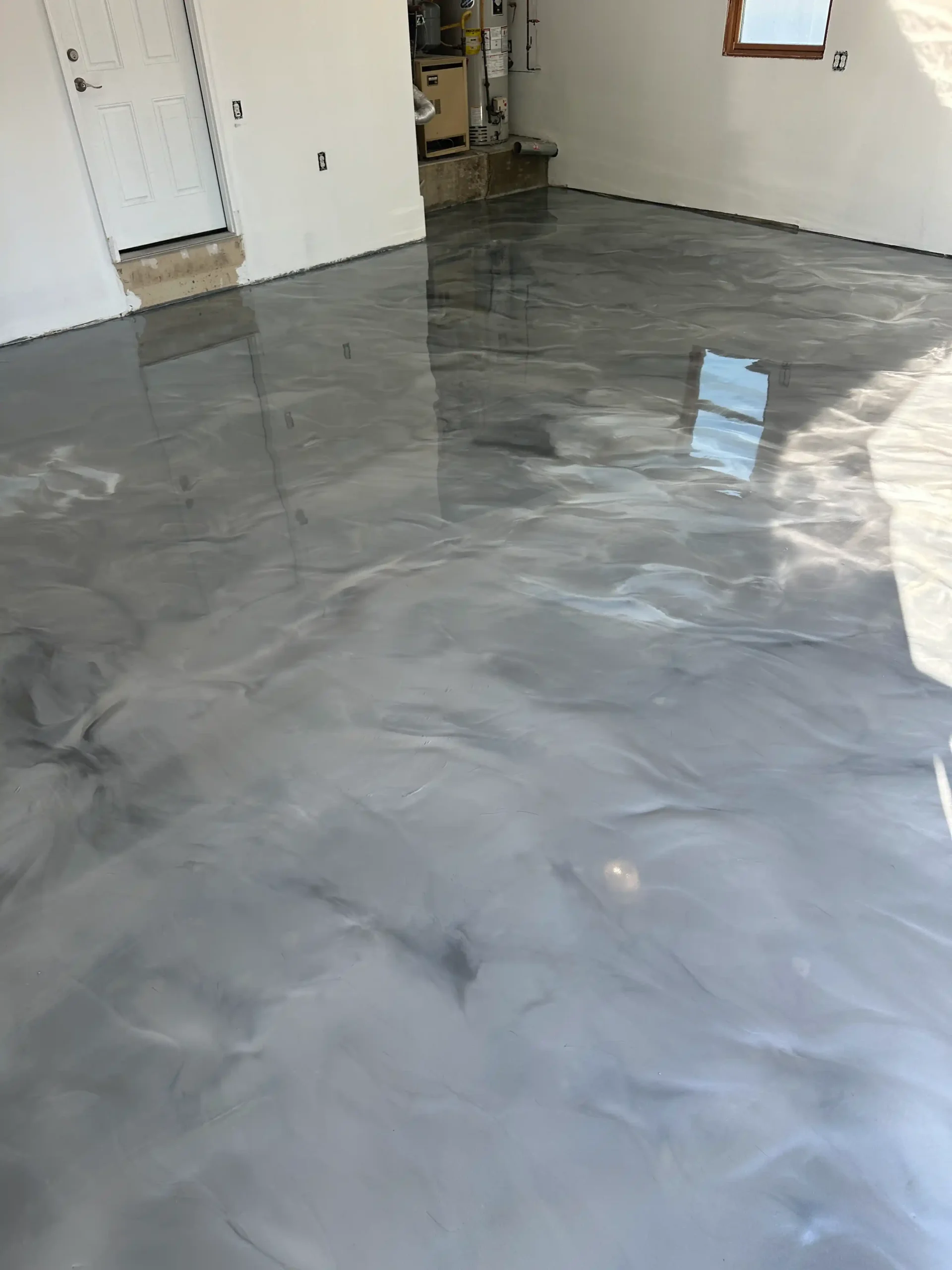 Concrete floor after metallic epoxy